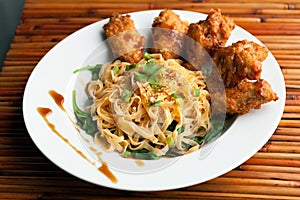 Chicken Wings with Noodles and Spinach