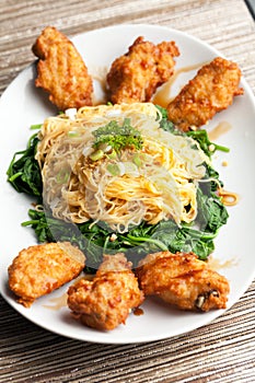 Chicken Wings with Noodles and Spinach