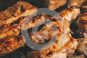 Chicken wings prepared on the grill during a barbecue