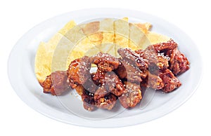 chicken wings in spicy sauce. popular pub dish