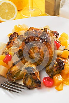 Chicken wings with tropical fruit