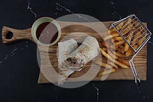 Chicken Wrap. Chicken fajita tortilla wrap sandwich. Tasty wraps with grilled chicken meat and fresh parsley