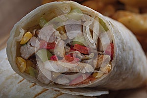 Chicken Wrap. Chicken fajita tortilla wrap sandwich. Tasty wraps with grilled chicken meat and fresh parsley