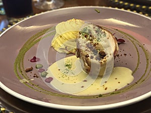 Chicken wrap served in a lavish dish at a dinner