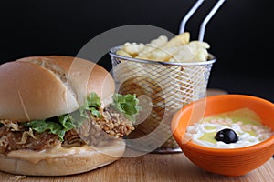 Chicken zinger burger with fries and dip
