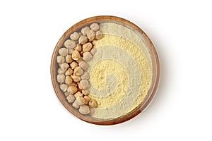 Chickpea beans and flour in wooden bowl on white background