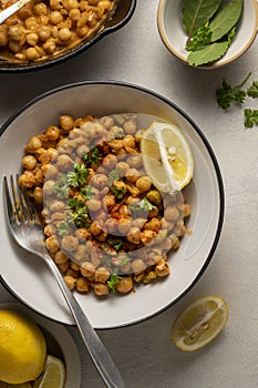 Chickpea dish with curry, cooked chickpeas with spices and herbs. Vegetarian food meal