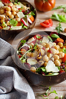 Chickpea salad with vegetables and microgreens photo