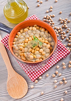 Chickpea soup in terracotta bowl.