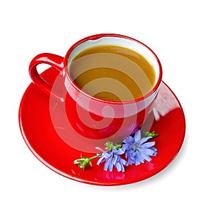 Chicory drink in red cup on saucer