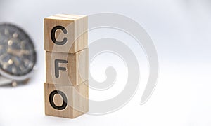 Chief Financial Officer - CFO text engraved on wooden blocks with customizable space for text. Copy space and Senior