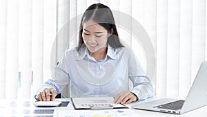 Chief marketing officer in Asia is analyzing the company`s financial growth graph using personal computers for work