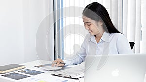 Chief marketing officer in Asia is analyzing the company`s financial growth graph using personal computers for work