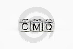 Chief Marketing Officer CMO concept with cubic metal letters