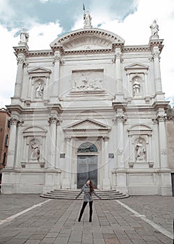 Chiesa di San Rocco. Beautiful tourist girl visiting famous land photo