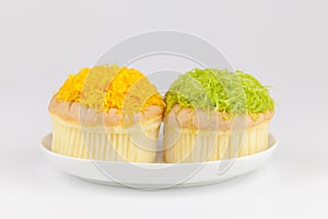 Chiffon cup cake in dish on white background