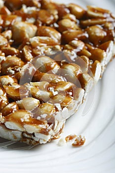 Chikki is a traditional ready-to-eat Indian sweet photo