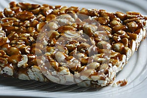 Chikki is a traditional ready-to-eat Indian sweet photo