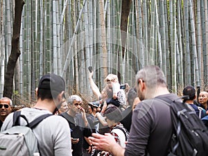 Arashiyama /kyoto, Japan - April 12, 2018 : Chikurin-no-Michi Bamboo Grove and group of tourism