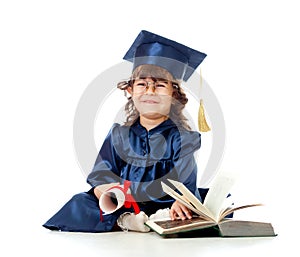 Child in academician clothes with book
