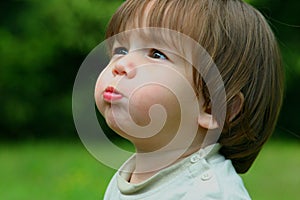 Child active blowing bubbles