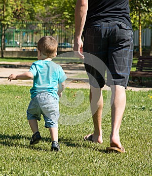 Child and adult in the park