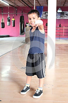 Child athlete practicing box