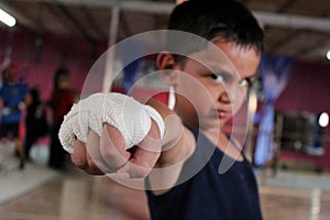 Child athlete practicing box
