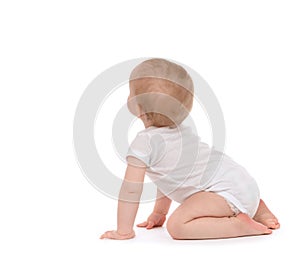 Child baby toddler sitting facing backwards back rear view