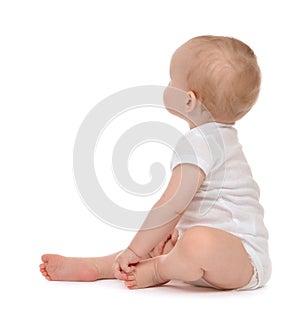 Child baby toddler sitting facing backwards photo