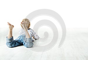 Child back lying down, looking forward