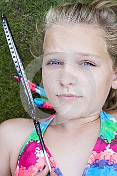 Child with badminton racket