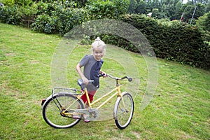 Child with bicycle