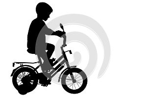 Child bicyclist silhouette with clipping path photo