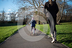 Child on the bike on the path