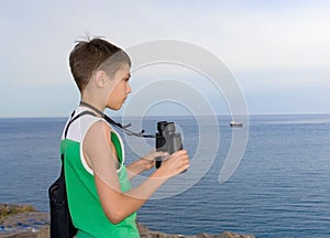 Child with binoculars