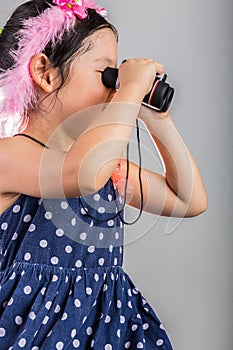 Child with Binoculars / Girl Using Binoculars