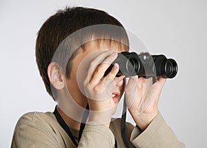 A child with binoculars