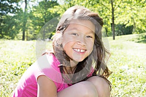 child with Blowing Curly Hair Cute Girl Outdoors