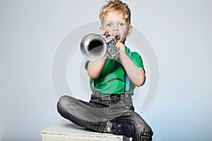 Child Blowing Trumpet