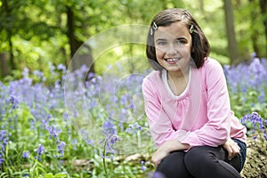 Child and bluebells