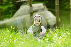 Child and blurred helicopter on natural background