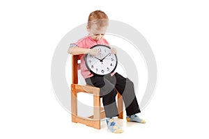 Child boss with clock and smart phone, time management concept isolated on white