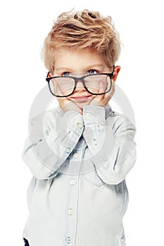 Child, boy and frame for glasses or eyecare in studio, lenses and vision health for eyesight. Male person, kid and