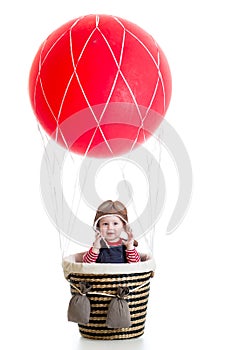 Child boy on hot air balloon isolated on white