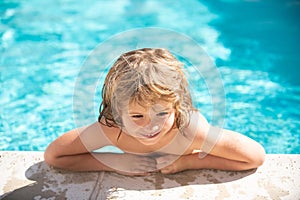 Child boy play in tropical resort. Children fun. Cute kid relaxing on swimming pool. Child having fun in summertime.