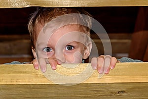 Child boy playing barn