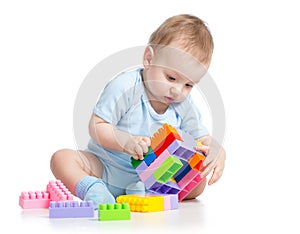 Child boy playing block toy