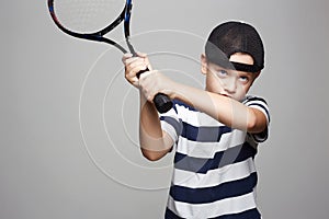 Child Boy Playing Tennis. Sport kids
