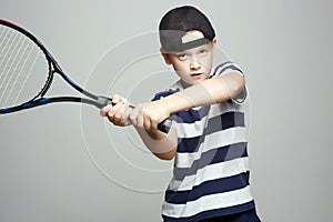 Child Boy Playing Tennis. Sport kids